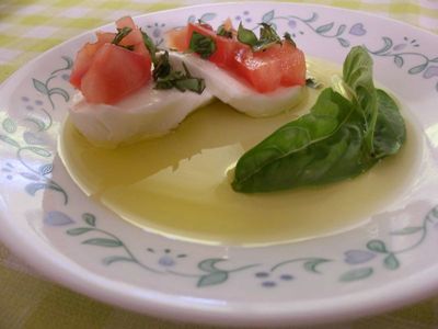 Photo of Mozzarella tomatoes and basil