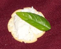 Afuega'l Pitu Blanco with Basil on a cracker